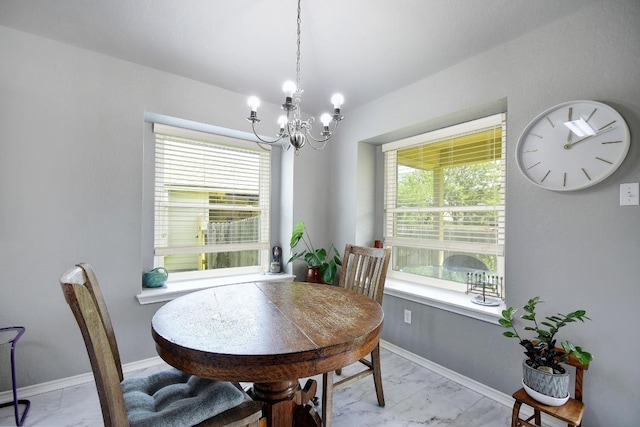 106 Wild Plum, San Marcos, TX 78666 - dining area featuring light marble finish flooring and a chandelier