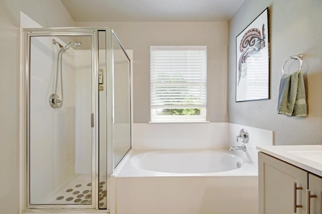 106 Wild Plum, San Marcos, TX 78666 - full bathroom featuring a bath, a shower stall, and vanity