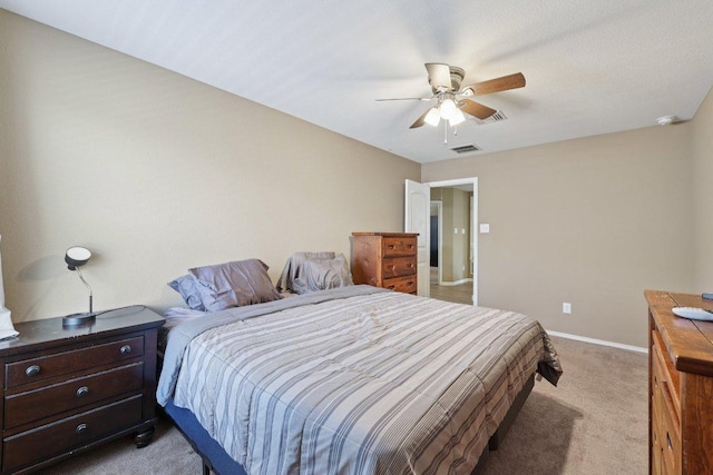 1124 Calla Lily Blvd, Leander, TX 78641 - bedroom with light carpet and ceiling fan