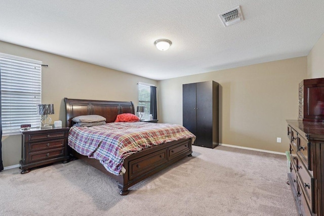1124 Calla Lily Blvd, Leander, TX 78641 - bedroom with light carpet