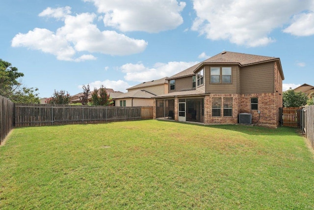 1124 Calla Lily Blvd, Leander, TX 78641 - back of house featuring brick siding and a fenced backyard
