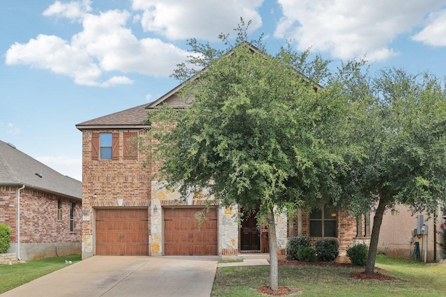 1124 Calla Lily Blvd, Leander, TX 78641 - view of front of house with concrete driveway, a garage, brick siding, and a front lawn