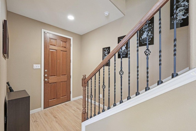 1124 Calla Lily Blvd, Leander, TX 78641 - entryway featuring wood finished floors, stairs, and recessed lighting