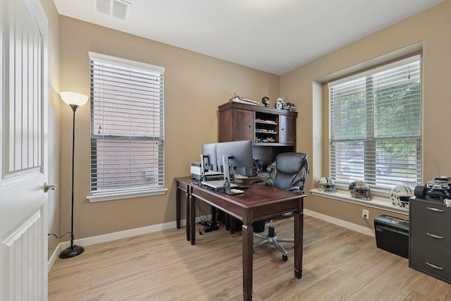 1124 Calla Lily Blvd, Leander, TX 78641 - office with light wood-style floors and plenty of natural light