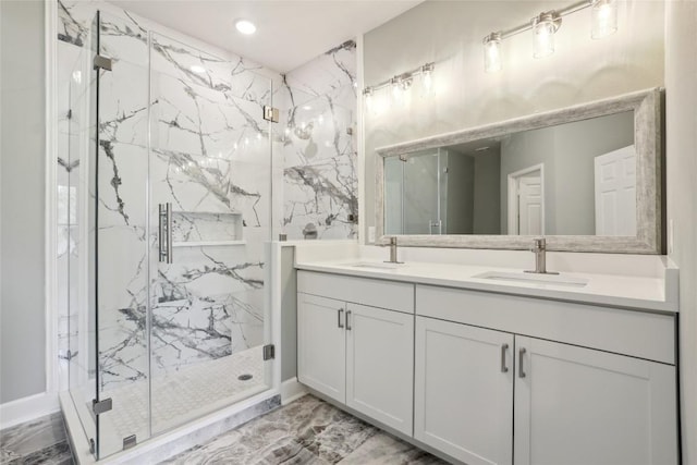 109 Creek Side Dr, Bastrop, TX 78602 - full bathroom with double vanity, marble finish floors, a marble finish shower, and recessed lighting