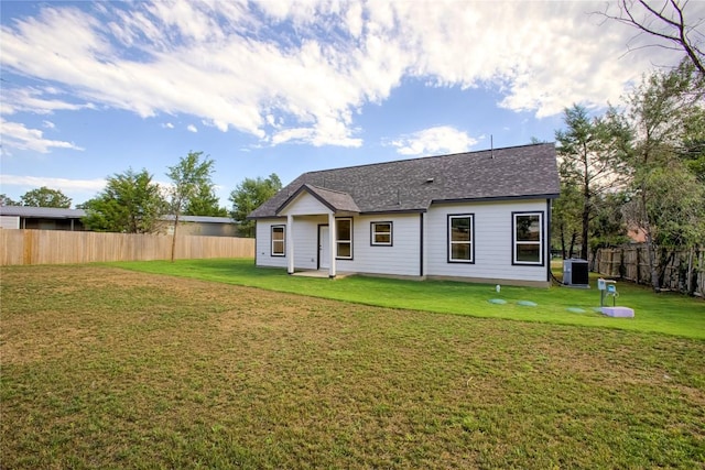 109 Creek Side Dr, Bastrop, TX 78602 - rear view of property with a shingled roof and a patio