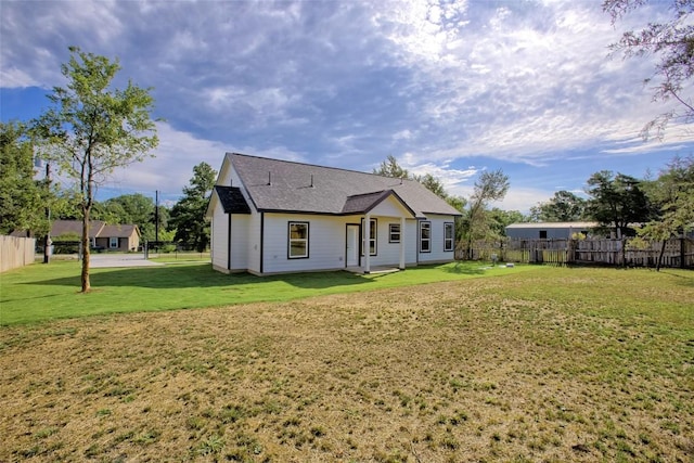 109 Creek Side Dr, Bastrop, TX 78602 - rear view of house with a shingled roof