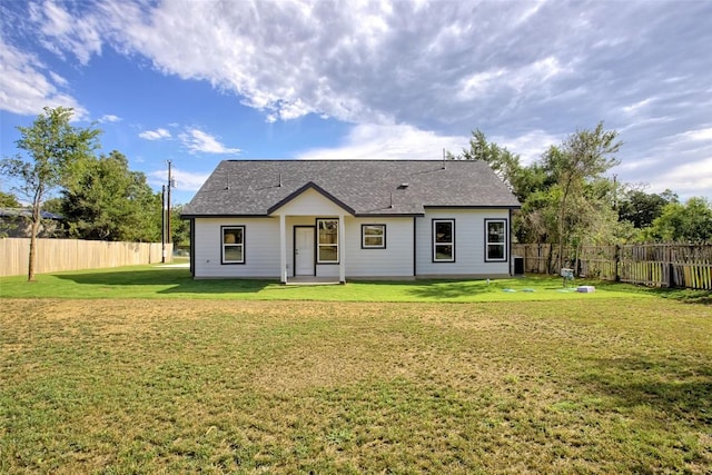 109 Creek Side Dr, Bastrop, TX 78602 - rear view of property featuring a shingled roof