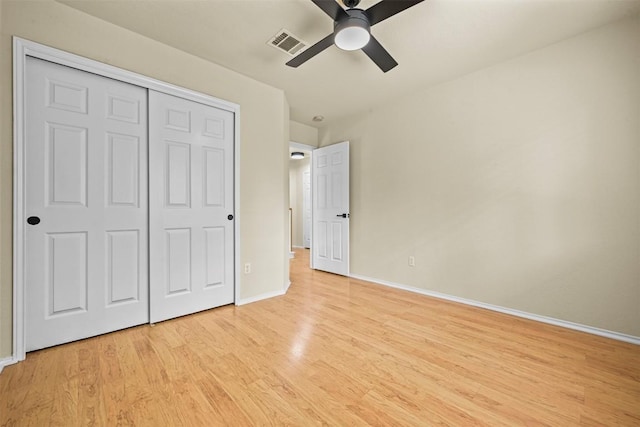 3528 Ruby Red Dr, Austin, TX 78728 - unfurnished bedroom with light wood-style flooring, a closet, and a ceiling fan