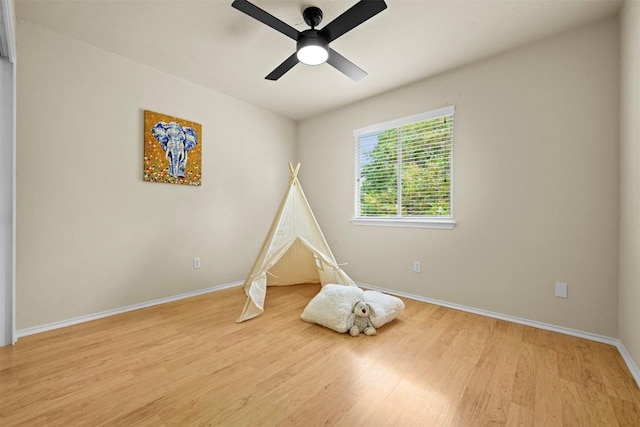 3528 Ruby Red Dr, Austin, TX 78728 - recreation room featuring wood finished floors and a ceiling fan