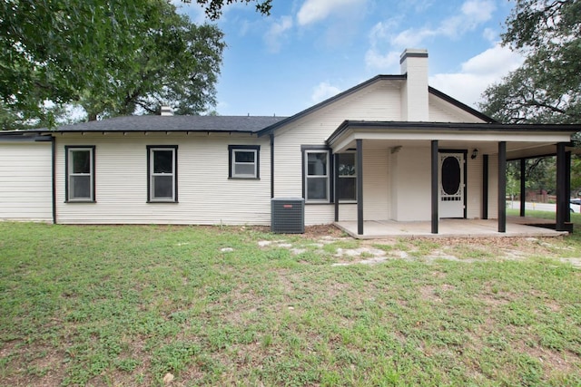 1414 E 4th St, Lampasas, TX 76550 - back of property with a yard and a chimney