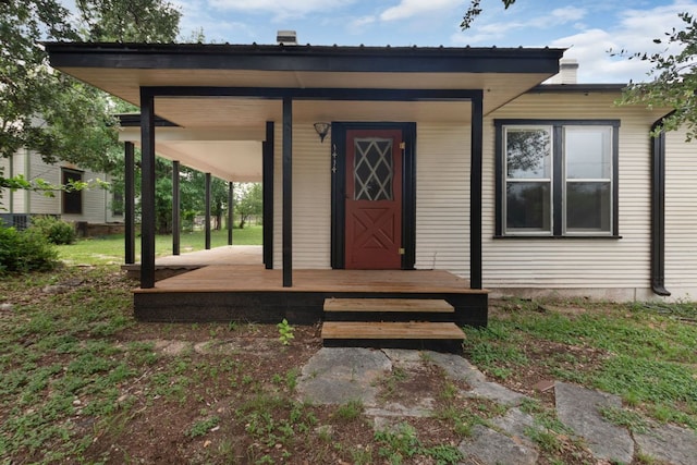 1414 E 4th St, Lampasas, TX 76550 - doorway to property featuring covered porch