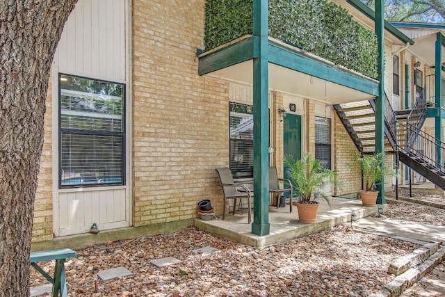 1624 Aquarena Springs Dr Unit B115, San Marcos, TX 78666 - doorway to property with brick siding