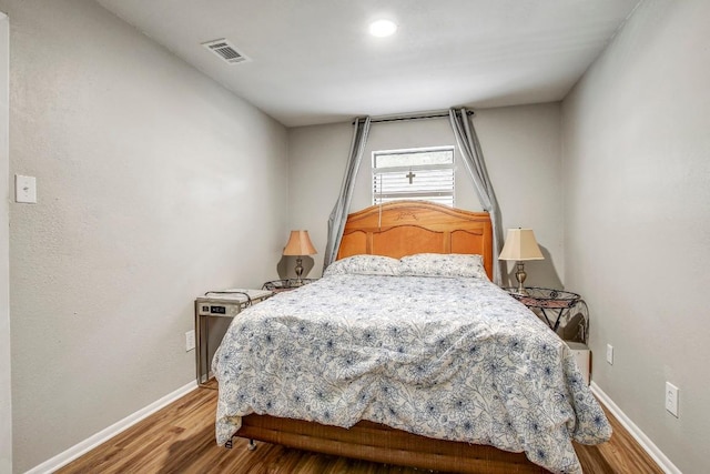 1624 Aquarena Springs Dr Unit B115, San Marcos, TX 78666 - bedroom with wood finished floors