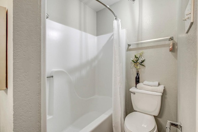 1624 Aquarena Springs Dr Unit B115, San Marcos, TX 78666 - full bath with a textured wall and shower / bathtub combination with curtain