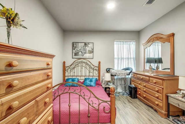 1624 Aquarena Springs Dr Unit B115, San Marcos, TX 78666 - bedroom with light wood finished floors