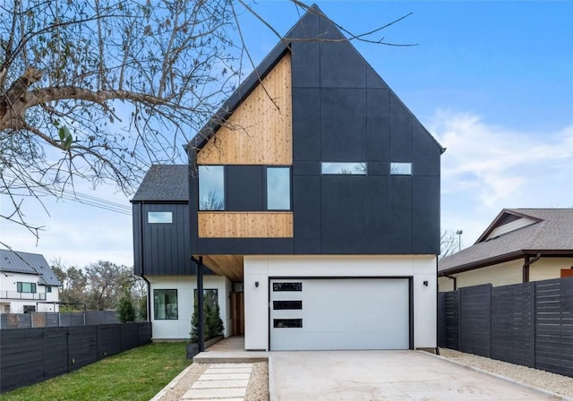 1703 Miami Dr, Austin, TX 78733 - view of front facade with driveway and an attached garage