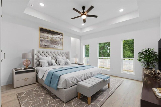 108 Bill St, Elgin, TX 78621 - bedroom featuring a raised ceiling, light wood-type flooring, recessed lighting, and ceiling fan