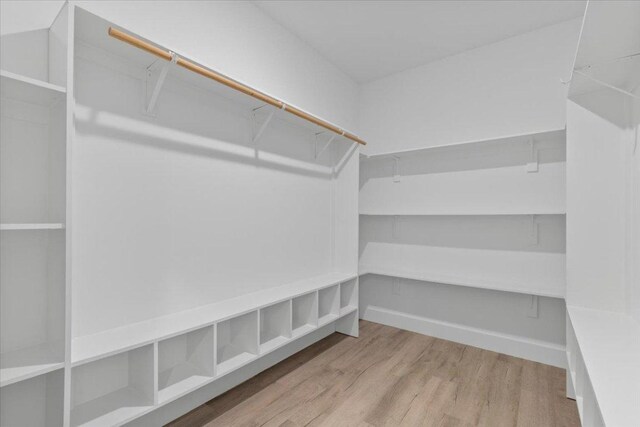 108 Bill St, Elgin, TX 78621 - walk in closet featuring wood finished floors
