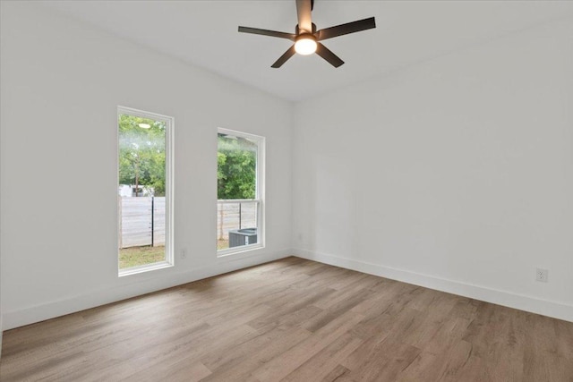 108 Bill St, Elgin, TX 78621 - unfurnished room featuring light wood-style flooring and ceiling fan