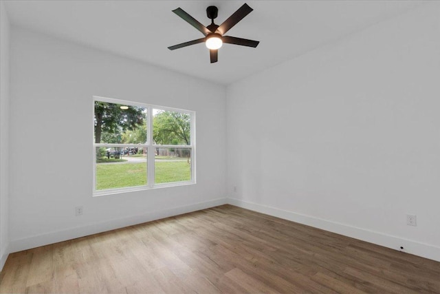 108 Bill St, Elgin, TX 78621 - unfurnished room with wood finished floors and a ceiling fan
