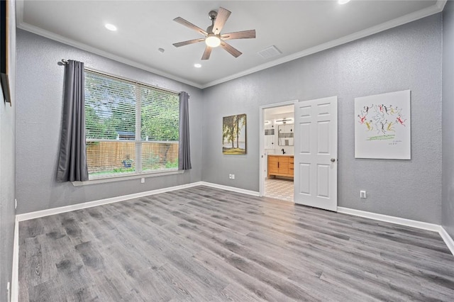 8721 Little Laura Dr, Austin, TX 78757 - empty room featuring crown molding, a textured wall, ceiling fan, wood finished floors, and recessed lighting