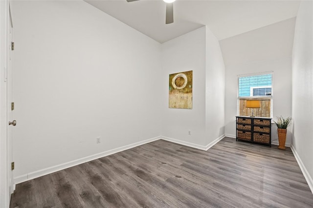 8721 Little Laura Dr, Austin, TX 78757 - unfurnished bedroom with vaulted ceiling, wood finished floors, and ceiling fan