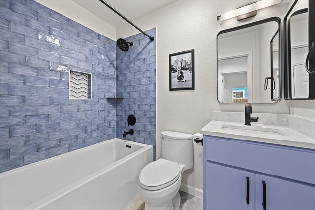 8721 Little Laura Dr, Austin, TX 78757 - bathroom with vanity, shower / washtub combination, and a textured wall