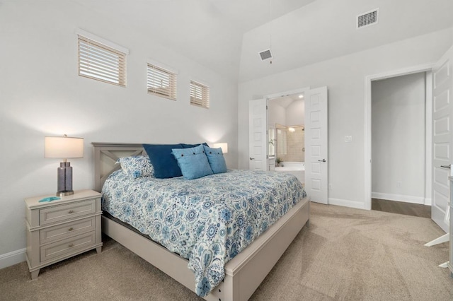 913 Landing Ln, Leander, TX 78641 - bedroom featuring light carpet and connected bathroom