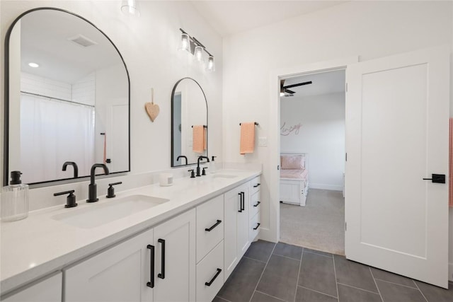 4100 Peak Look Out Dr, Austin, TX 78738 - full bathroom with double vanity and tile patterned flooring