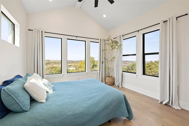 4100 Peak Look Out Dr, Austin, TX 78738 - bedroom featuring wood finished floors, multiple windows, beamed ceiling, recessed lighting, and ceiling fan