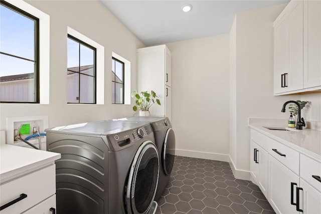 4100 Peak Look Out Dr, Austin, TX 78738 - washroom featuring independent washer and dryer, recessed lighting, and cabinet space