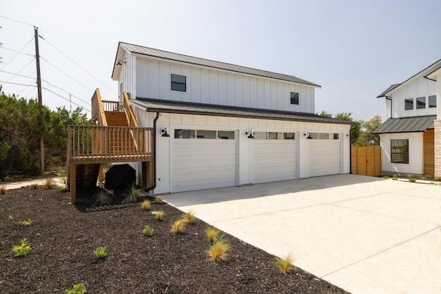 4100 Peak Look Out Dr, Austin, TX 78738 - view of front facade featuring board and batten siding, stairs, and a metal roof