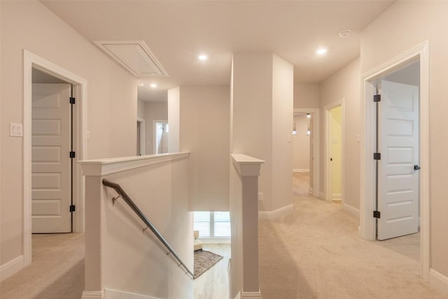 103 Periwinkle Ln, Bastrop, TX 78602 - hallway with an upstairs landing, attic access, light colored carpet, and recessed lighting