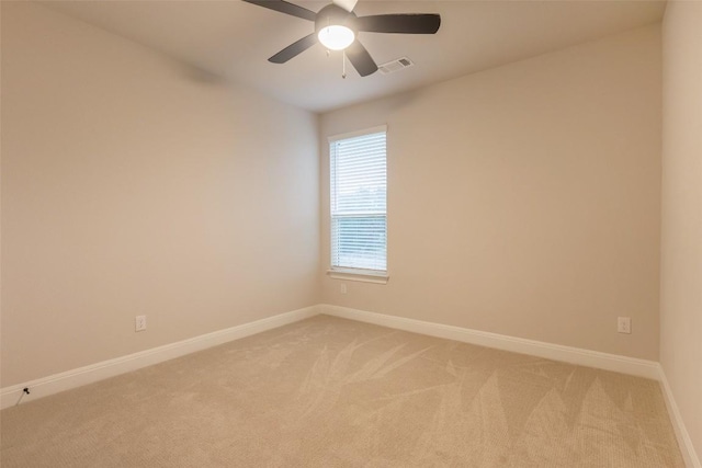 103 Periwinkle Ln, Bastrop, TX 78602 - spare room featuring light colored carpet and ceiling fan