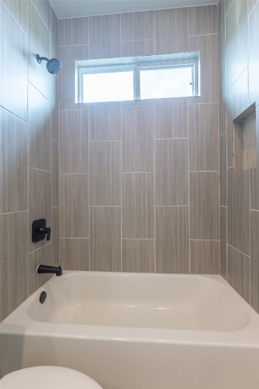 103 Periwinkle Ln, Bastrop, TX 78602 - full bath with bathing tub / shower combination and toilet