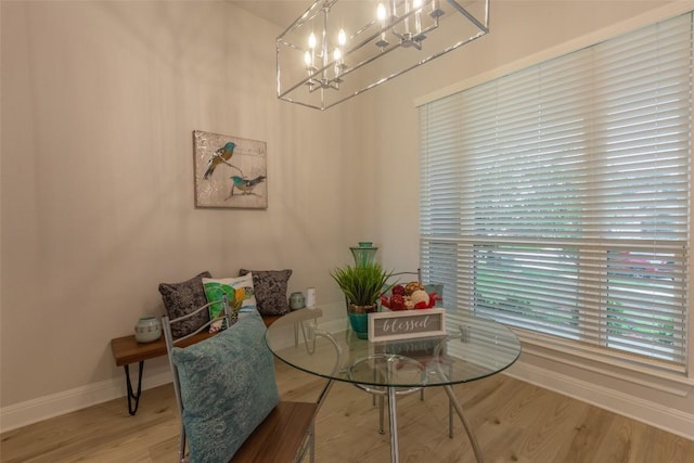 103 Periwinkle Ln, Bastrop, TX 78602 - dining area with a chandelier and wood finished floors