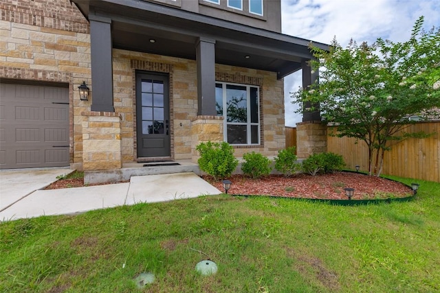 103 Periwinkle Ln, Bastrop, TX 78602 - property entrance featuring stone siding and a porch