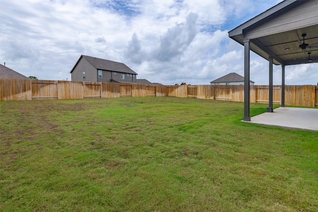 103 Periwinkle Ln, Bastrop, TX 78602 - fenced backyard featuring a patio area and ceiling fan