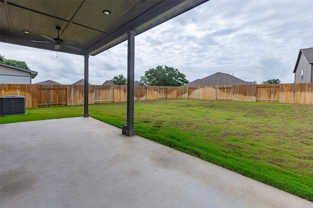 103 Periwinkle Ln, Bastrop, TX 78602 - fenced backyard with a ceiling fan and a patio