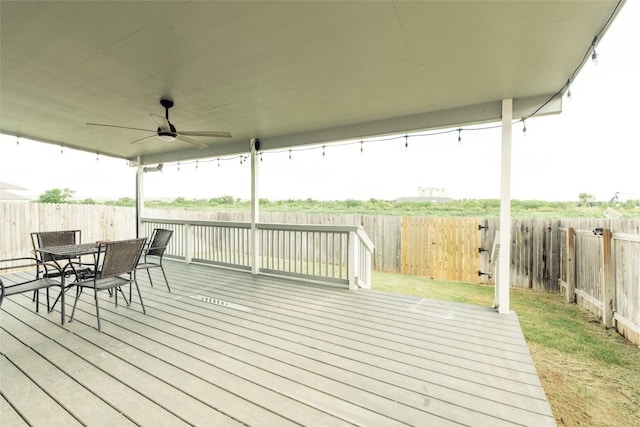324 Millbrook Blvd, San Marcos, TX 78666 - wooden terrace with a fenced backyard, ceiling fan, and outdoor dining area