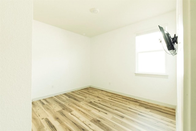 324 Millbrook Blvd, San Marcos, TX 78666 - unfurnished room with light wood finished floors and baseboards