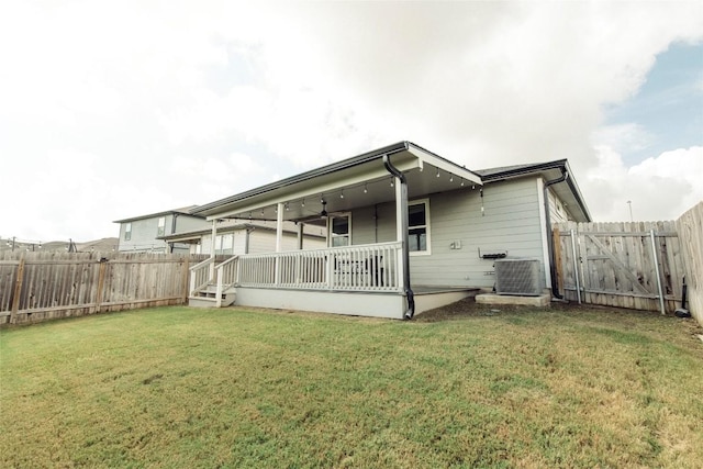 324 Millbrook Blvd, San Marcos, TX 78666 - rear view of property with a fenced backyard and a ceiling fan