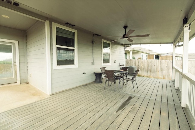 324 Millbrook Blvd, San Marcos, TX 78666 - wooden deck with outdoor dining space and ceiling fan