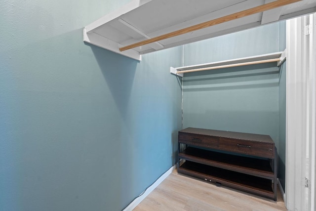 1240 Barton Hills Dr Unit 114, Austin, TX 78704 - spacious closet with wood finished floors