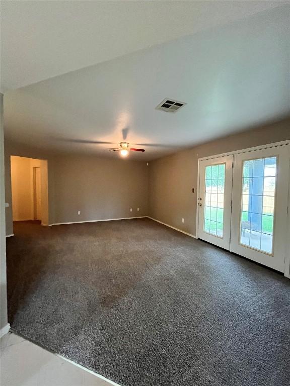 108 Bexar Forest Cv, Elgin, TX 78621 - carpeted spare room with a ceiling fan and baseboards
