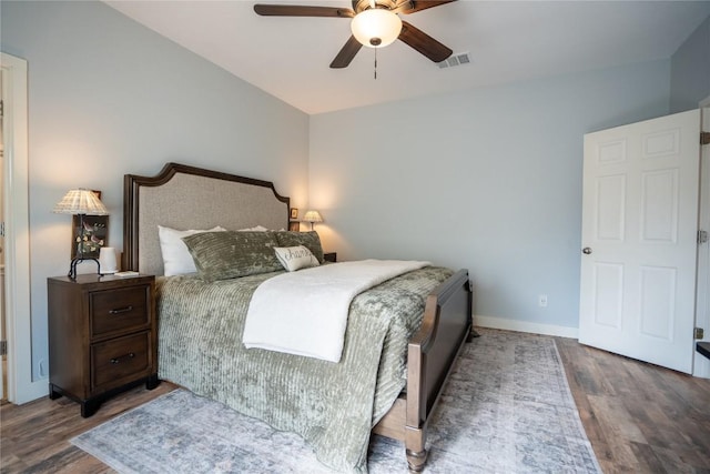 1410 Sherry Dr, Taylor, TX 76574 - bedroom with wood finished floors and a ceiling fan