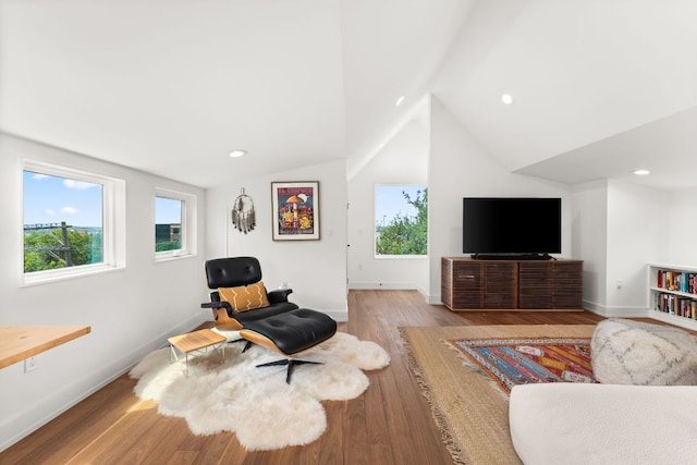 606 Augusta Ave Unit 1, Austin, TX 78703 - living area with plenty of natural light, light wood finished floors, vaulted ceiling, and recessed lighting