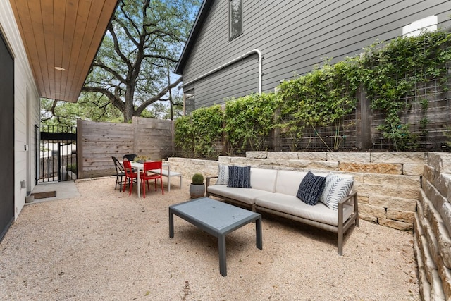 606 Augusta Ave Unit 1, Austin, TX 78703 - fenced backyard featuring a patio area and outdoor lounge area