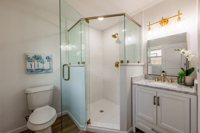 106 Heron, Highland Haven, TX 78654 - full bath featuring vanity, a stall shower, and wood finished floors